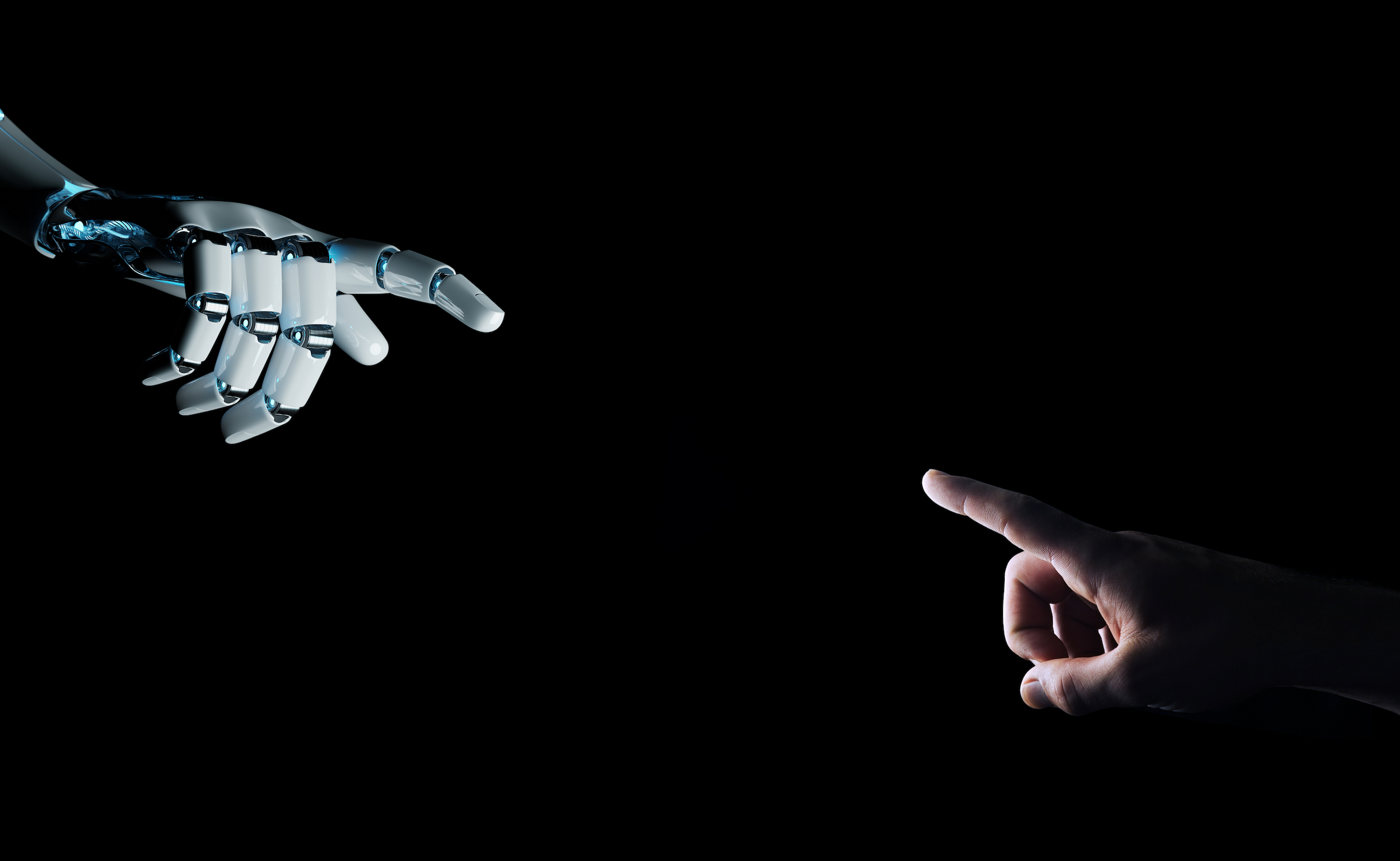 Robot,Hand,Making,Contact,With,Human,Hand,On,Dark,Background